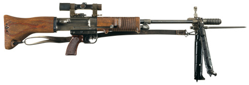 Rare World War II German FG-42 paratrooper rifle with bayonet, scope, and bipod.Estimated Value: $16