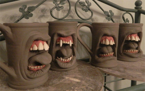 welcome-foolishmortals:  These monstrous stoneware mugs are the work of folk artist Ron Free and his Big Duluth Creative Studio located in Carrollton, Georgia. Visit Ron’s Facebook page to view more of his awesome creations. [via 