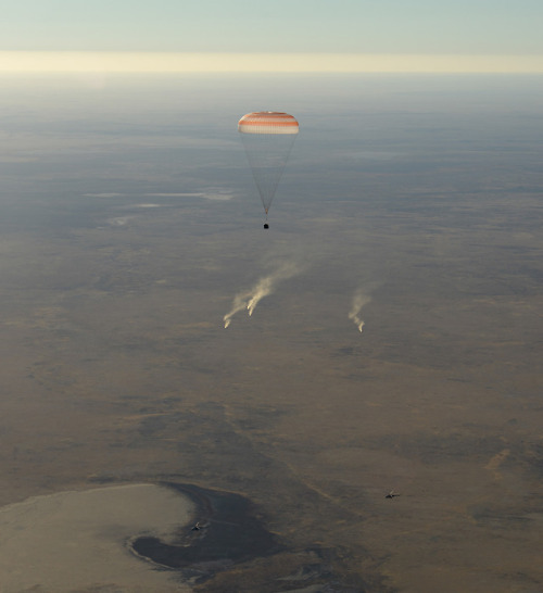 Home Again! Space Station Crew Lands : The landing jets fire as the Soyuz MS-08 spacecraft lands wit