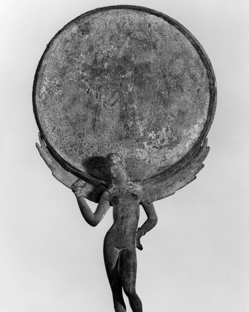 arthistoryfeed:Ancient Etruscan Mirror with Female Figure and Engraved Scene, bronze, 3rd century BC