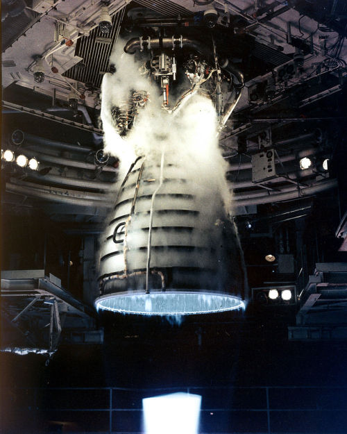 s-c-i-guy:  Shuttle Main Engine Test Firing A remote camera captures a close-up view of a Space Shuttle Main Engine during a test firing at the John C. Stennis Space Center in Hancock County, Mississippi. The bright area at the bottom of the picture is