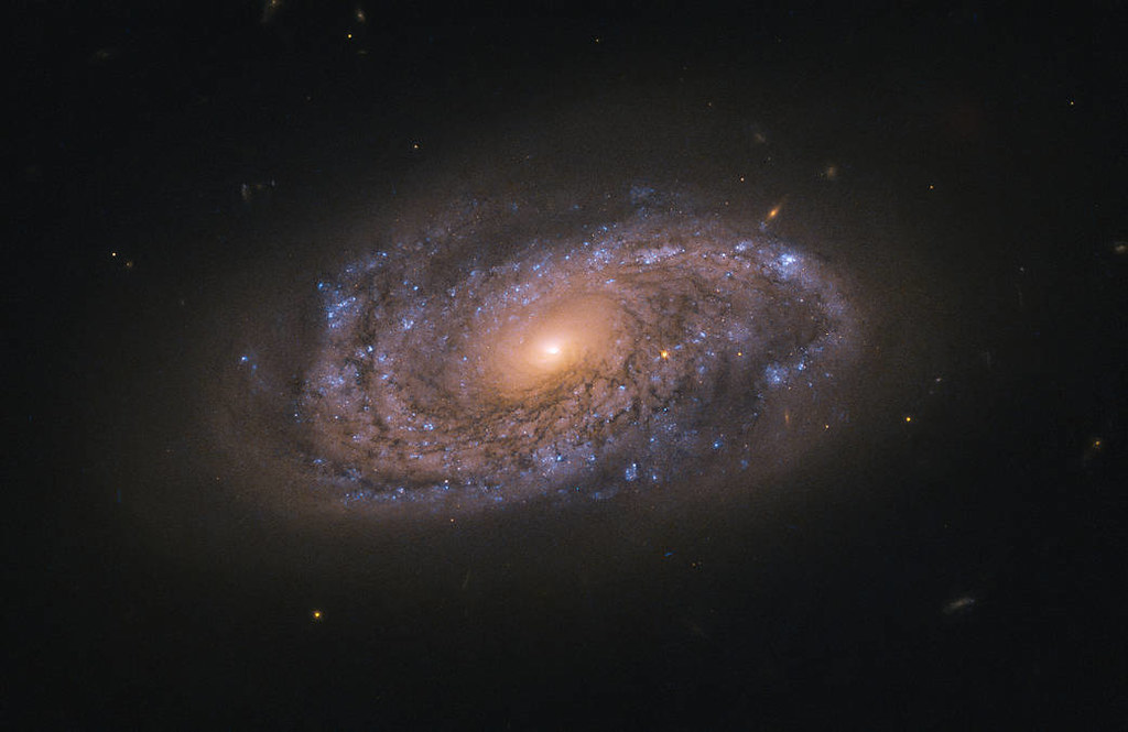 Hubble Probes Colorful Galaxy by NASA Hubble