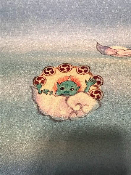 Super cute thunder oni nestled in a cloud (seen on). In traditional Japanese art, raijin (thunder sp