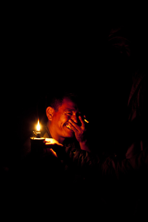 &lsquo;Picture of the Day&rsquo;Having a good time in candle light during load-shedding hours on a c