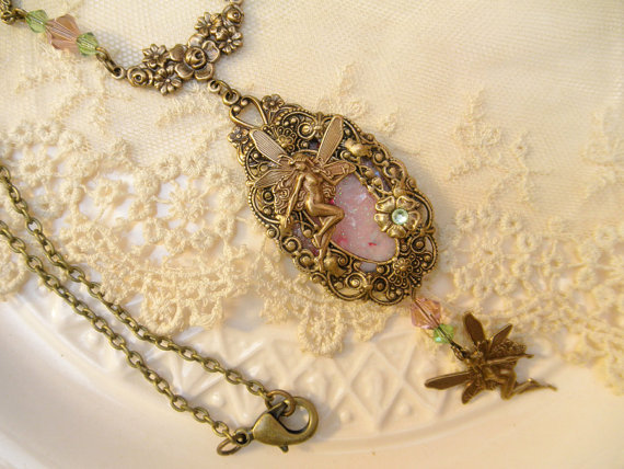 wickedclothes:    Fairies’ Dance NecklaceThe dance of the fairies happens on your