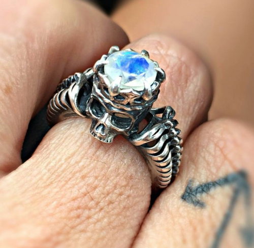 Arcana II - antiqued sterling silver with a flashy facet cut rainbow moonstone.Lovely photo by our d