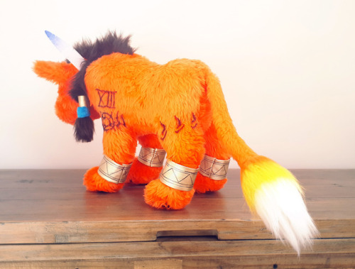 I finally made a Red XIII plush. This is reworked from an earlier attempt in order to get the body p