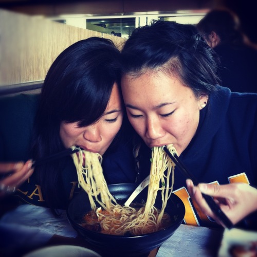 Spicy seafood ramen from Ajisen Ramen. And then the spicy seafood ramen being devoured by two hungry