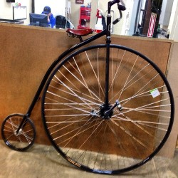 Somebody rode this to work last week at the Peggy Notebart(sp?) Nature Museum. #really #bike #bigasswheel #lilasswheel