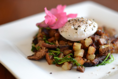 we are eating breakfast for dinner again: this is a hash with watercress, leftover brisket, a small 