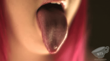 missfreudianslit:  Long tongues make you drool, don’t they? Sensuous sucking and licking, all over this delicious treat….. Changing the color of my tongue and making my lips so messy and sticky! My wet tongue rotating it and licking all the color