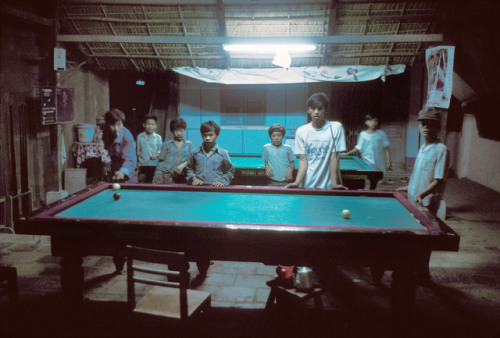 unearthedviews: CAN THO. 1994. VietnamYoung boys playing in a billiard hall.