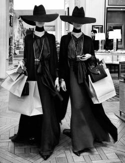 hexurbanity:  A pair of models leaving a hotel lobby on their way to a photoshoot during the 1992 Which Witch? fashion show in Paris. This candid gained great publicity in magical society throughout all of Europe; quickly becoming one of the most famous