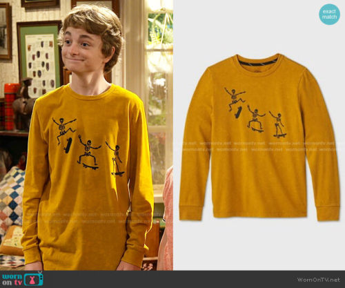 Finn’s yellow skeleton and skateboard print tee on Bunkd Skateboard Graphic T-Shirt by Art Class at