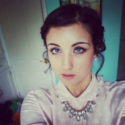 Kinda tried to do dolly ish eye makeup today. This is just before some horrendous collage @charrkoddy made of us!   #me #selfie #eyes #makeup #updo #pink #shirt #necklace #gems #mixed