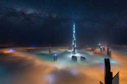 nubbsgalore: photos from dubai’s 828 meter tall burj khalifa (save the first photo, which show the building). duabai only experiences this in september and march, when seasonal changes in temperature creates an abundance of early morning fog. (click
