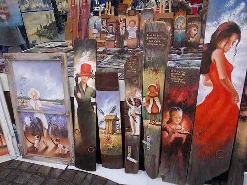 Paintings on pieces of wood.