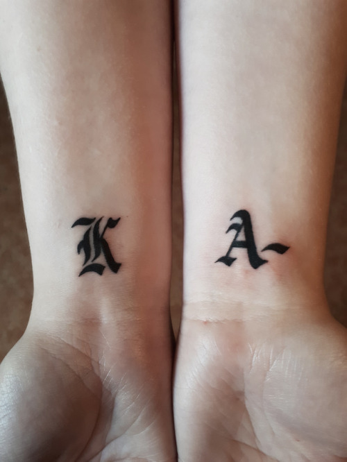 Letter K tattoo located on the hand