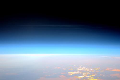 ‘Space station view of rare noctilucent clouds’Image credit: ESA/NASA“Expedition 4