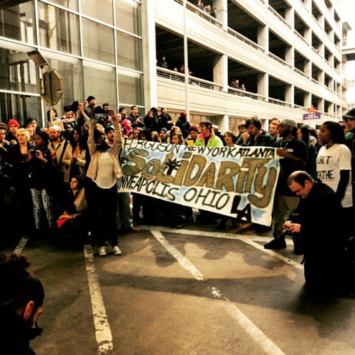 thinksquad:  A mass of demonstrators chanting, “Black lives matter,” converged in the Mall of America rotunda Saturday as part of a protest against police brutality that caused part of the mall to shut down on a busy day for holiday shopping. The