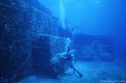 sixpenceee:  The Yonaguni Underwater Mystery The Yonaguni Monument is a massive underwater rock formation off the coast of Yonaguni in Japan. While many archaeologists and geologists believe that it is a natural formation, some hold the view that some