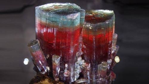 The SteamboatAt nearly a foot tall this pair of red tourmaline crystals with green tips is one of th