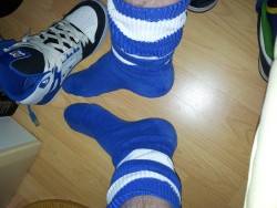 Men in rugby and footy socks