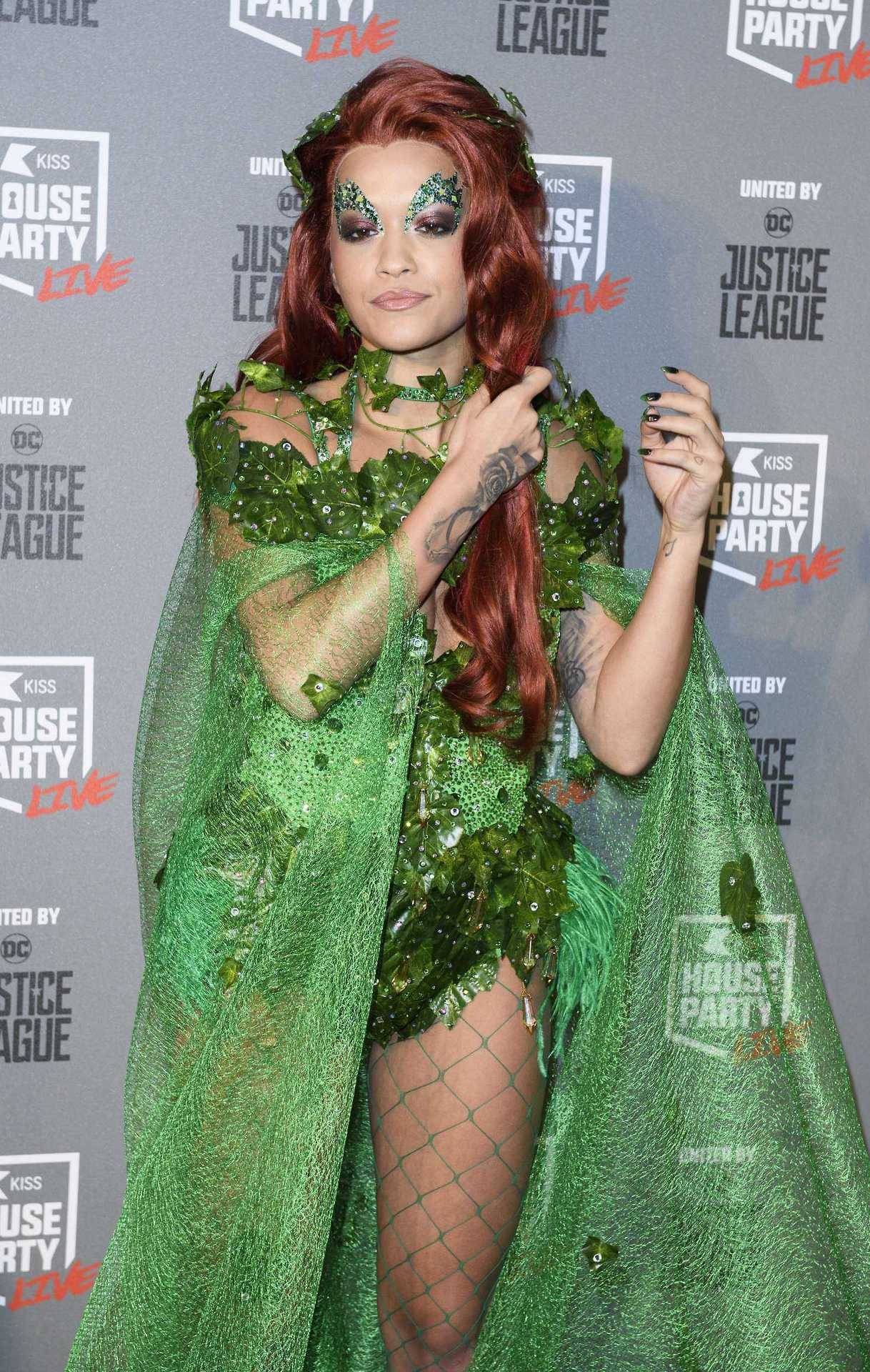 Rita Ora in green fishnets pantyhose