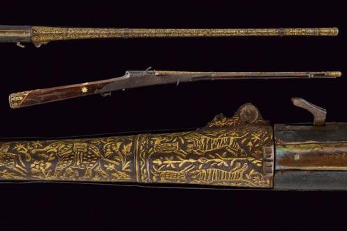Gold inlaid matchlock torador, India, 19th century.from Czerny’s International Auction House