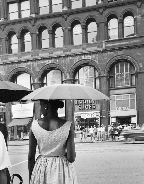 lostinurbanism:  Woman with Umbrella, Bill Rauhauser (c.1955)