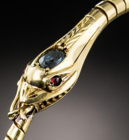 roses–and–rue:Victorian snake bracelet made of 18k gold, rubies, and sapphire.