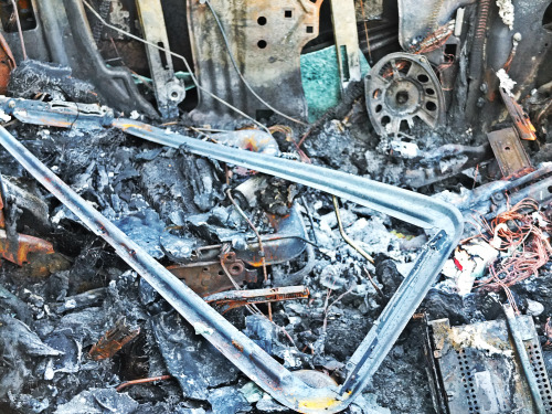 A Completely Burnt Out Car That I Saw After Coming Home From The Gym. Looks As If Someone Threw A Molotov