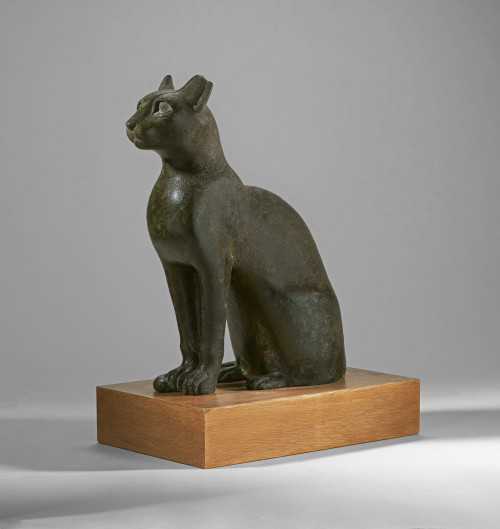 An Egyptian bronze cat, Ptolemaic period, c. 332-30 B.C. 14¾ in (37.4 cm) high.Courtesy of Christie’