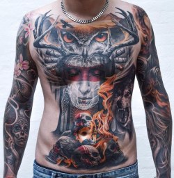 HEAVILY TATTOOED