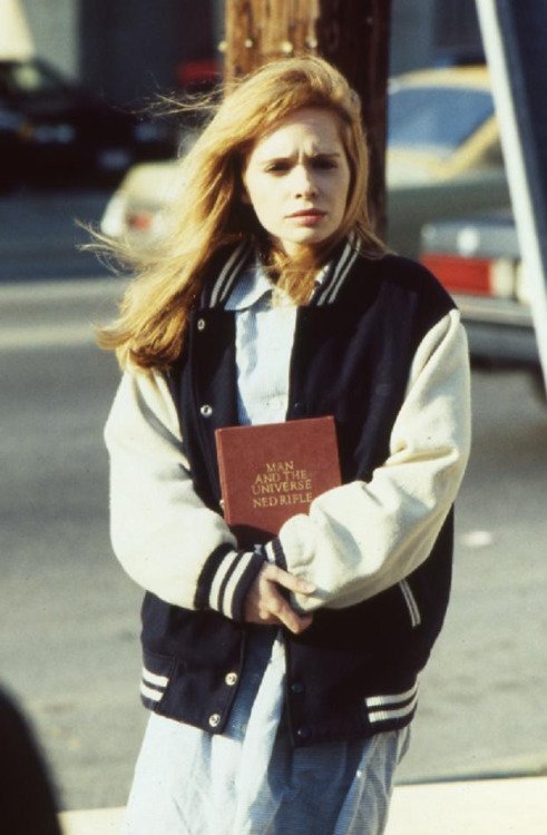 Adrienne Shelly holding Ned Rifle book in Trust by Hal Hartley