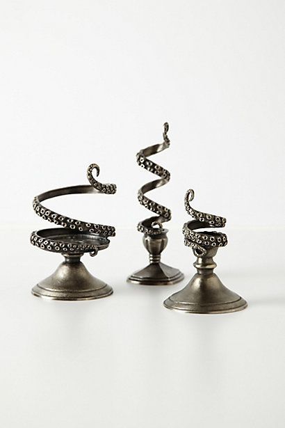 spinster-witch:  cinnamonknickers:  witchcraftings:  staceythinx:  Tentilla Coil Candle Holders from Anthroplogie  Sea witches? Yeah?  spinster-witch we need these things!!!  Yes please! 