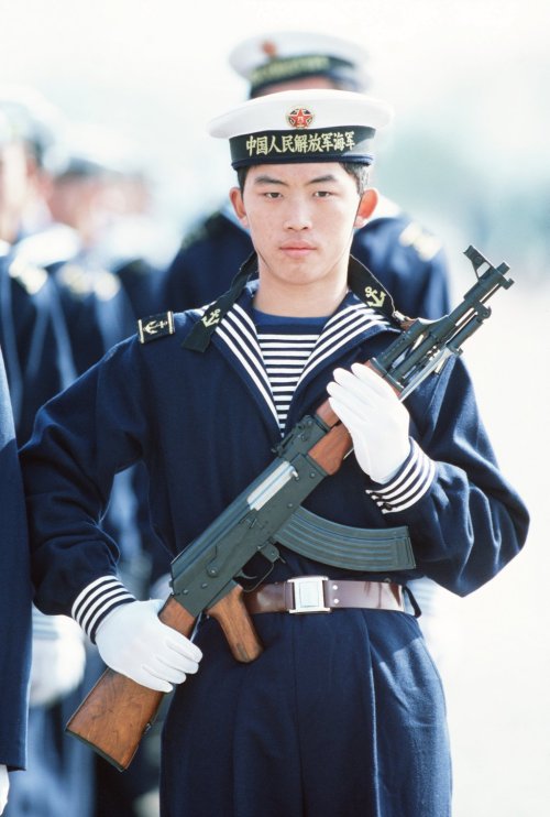 peashooter85:The Chinese Type 56 Assault Rifle, The AKM assault rifle is the most mass produced and 
