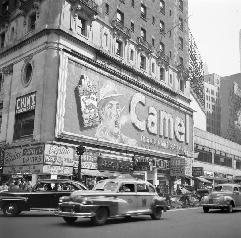 greeneyes55:  Smoking Billboard  Times Square New York 1948  Photo: Willem van