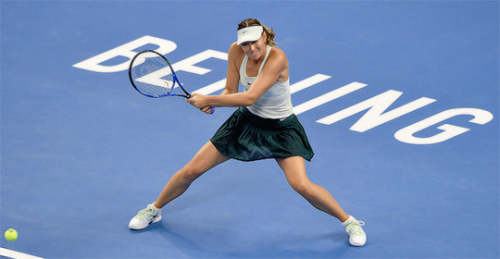 Maria Sharapova defeats Anastasija Sevastova 7-6, 5-7, 7-6 in the first round of the China Open.