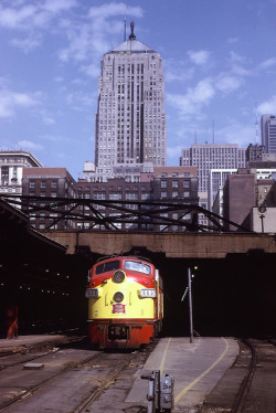 marmarinou:  rr452 by George Hamlin on Flickr. Rock Island Line train at the south end of La Salle Street Station with the Chicago Board of Trade building in the background. Chicago April 1971 Photo by George Hamlin 