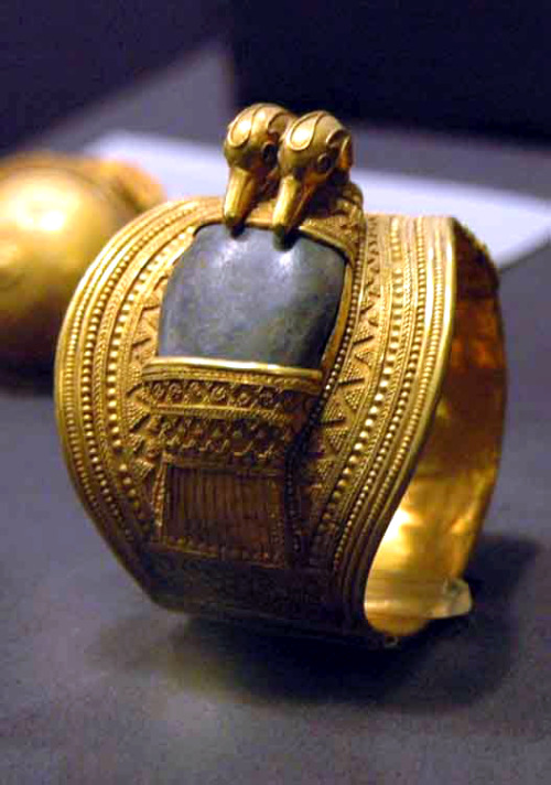 Solid gold bracelets set with lapis lazuli and bearing the cartouches of Ramesses II