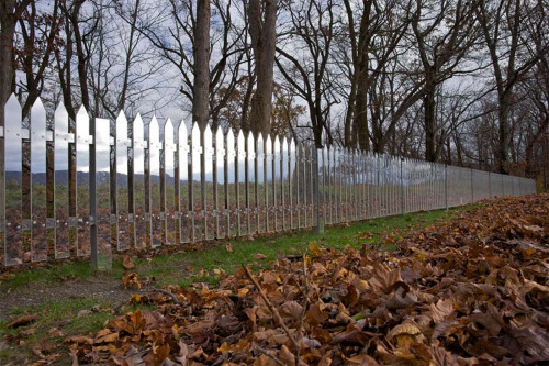 A Fence of Mirrors Reflects the Changing Landscape Created by artist Alyson Shotz