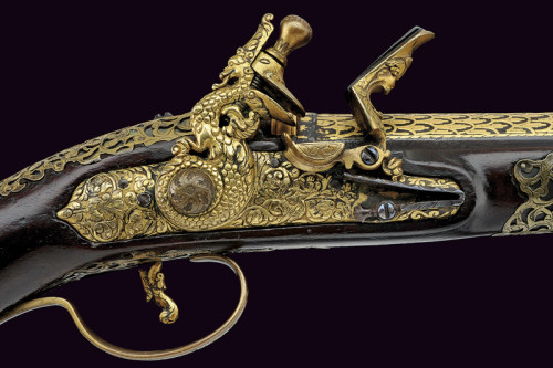 peashooter85:Gold decorated flintlock pistol originating from Northern Italy, early 18th century.