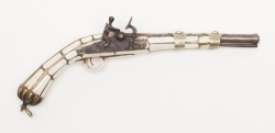 peashooter85:  An ornate bone and silver