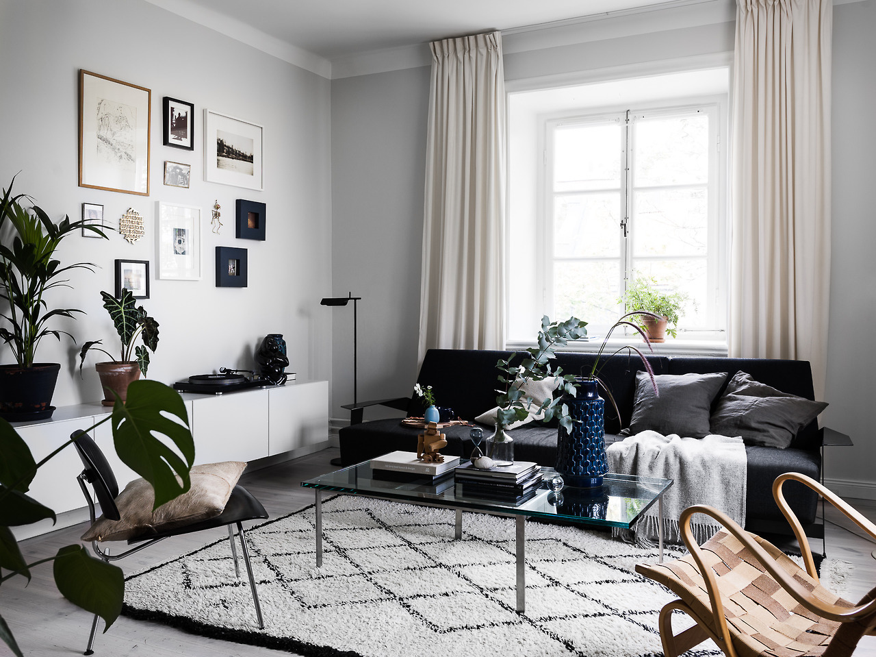 Scandinavian Living Room With Black Futon