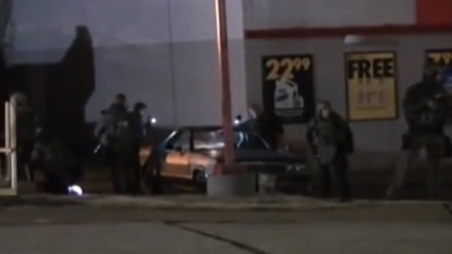 caliphorniaqueen:  trexbait:   quickweaves:  krxs10:  in case you missed it: a new video surfaced on the Internet this week showing SWAT team police officers setting fire to a car and the building next to it right after the announcement that Darren Wilson