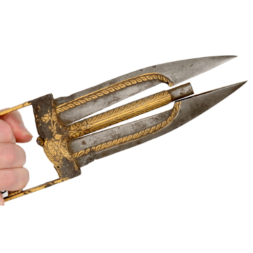 peashooter85:  A katar dagger from India, the blade of which opens to reveal a pistol.