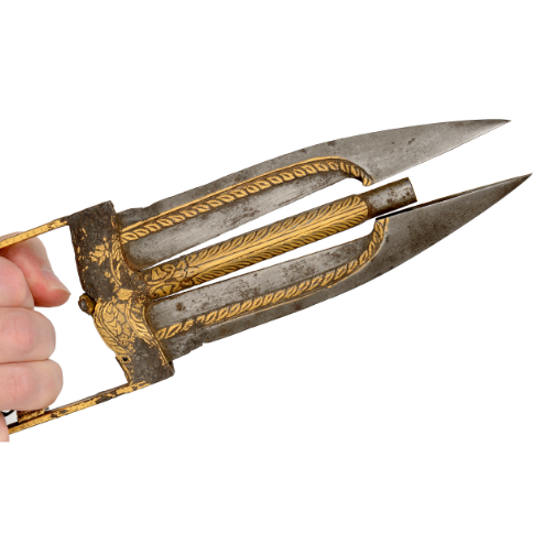 peashooter85:  A katar dagger from India, the blade of which opens to reveal a pistol. Mid 19th century. from Cowan’s Auctions 