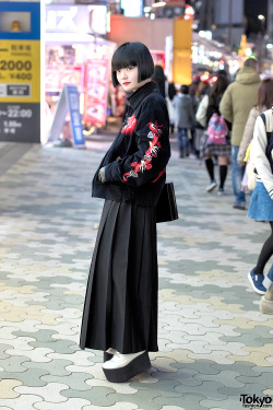 tokyo-fashion:  21-year-old Japanese architect Kurumi on the street in Harajuku wearing a Tailor Toyo souvenir jacket with a Comme Des Garcons pleated maxi skirt, Murua platforms, and a Moussy box purse. Full Look 
