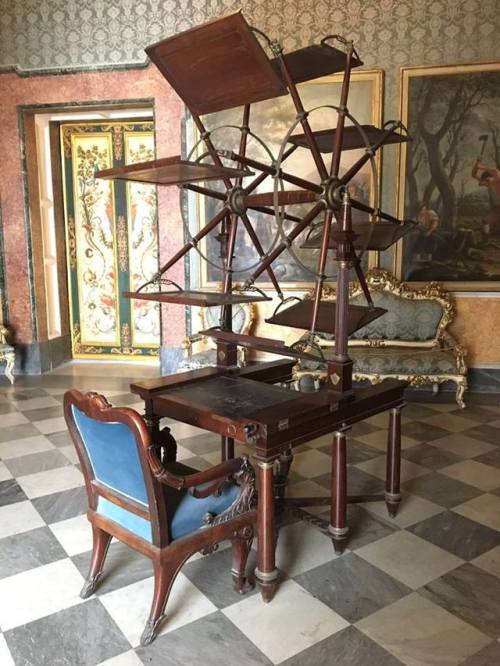 steampunktendencies:Eighteenth-century rotating table allowing readers to view multiple volumes at o